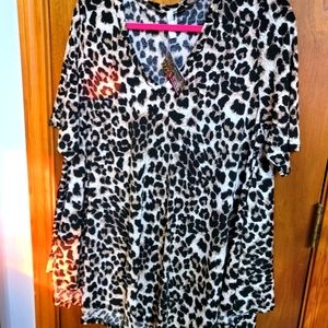 New without tags  Leopard print blouse.  Size 3XL.